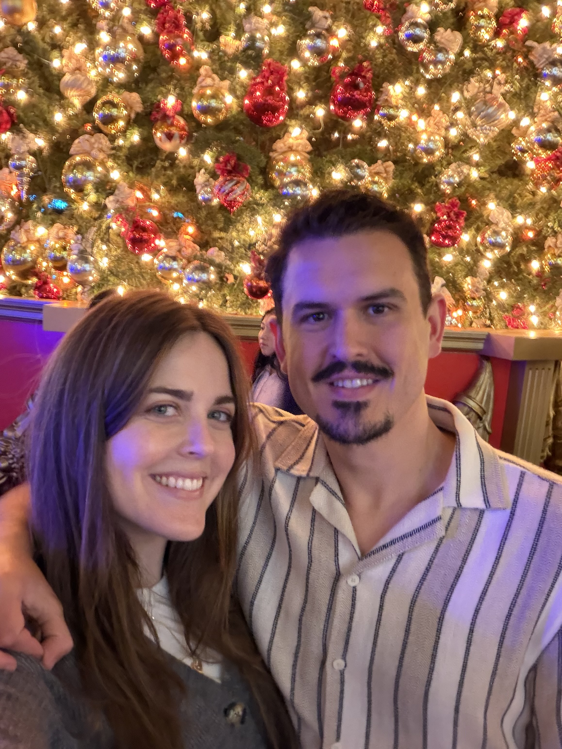 Ashley and Max at a holiday party