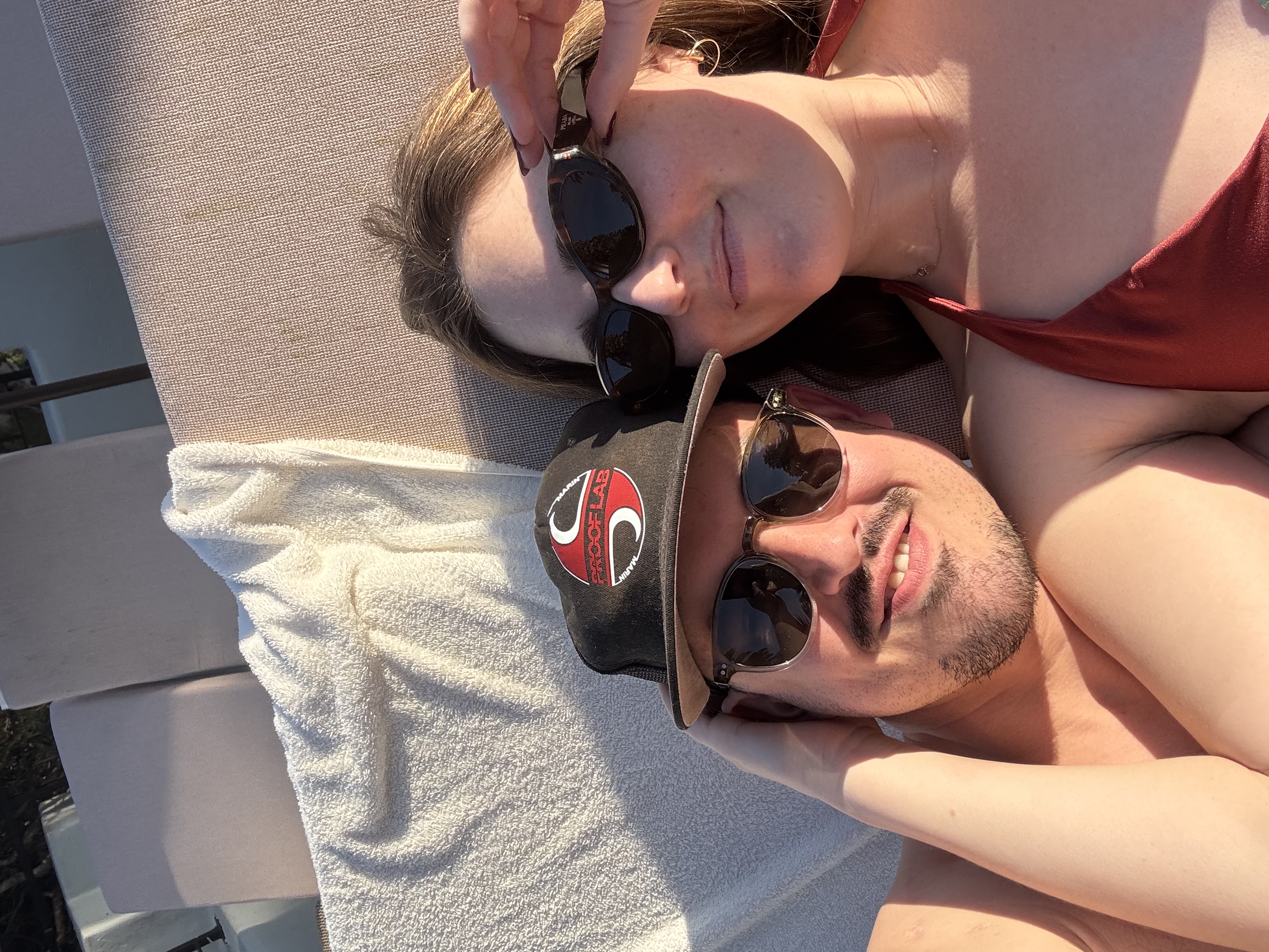 Ashley and Max relaxing poolside